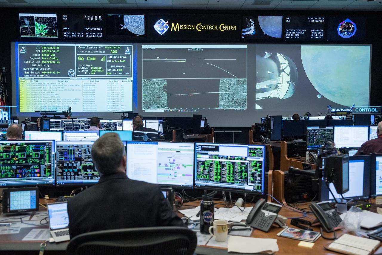 jsc2022e089168 (Nov. 21, 2022) During flight day 6 of the 25.5-day Artemis I mission, Lead Flight Director Rick LaBrode monitors the progress of the Outbound Powered Flyby (OPF) in the White Flight Control Room at Johnson Space Center in Houston. burn monitored by. The OPF burn set Orion on a course to fly by the Moon at a closest distance of 81 miles (130.5 kilometers).